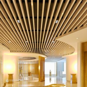 Modern baffle ceiling system with suspended metal panels for enhanced aesthetics and acoustics.