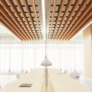 Modern baffle ceiling system with suspended metal panels for enhanced aesthetics and acoustics.