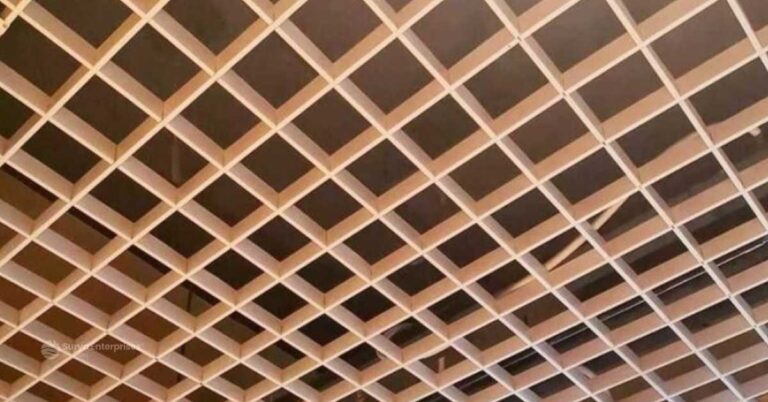 Wood finish aluminium open cell ceiling installation by Surya Enterprises at Carmel, Kerala