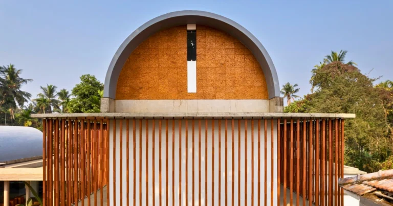 Weather-resistant facade system on hotel building in Kerala during monsoon